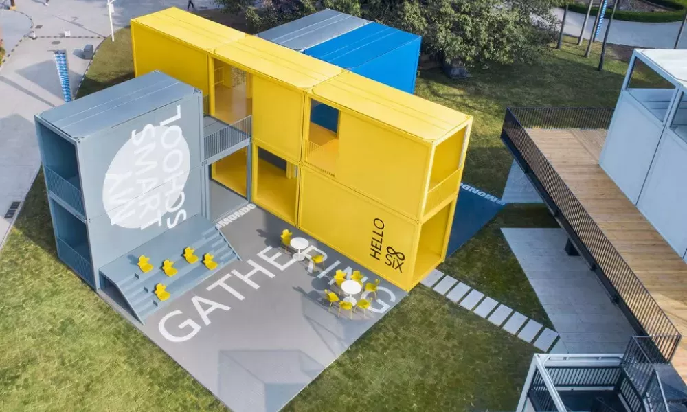 Caja de casa contenedora en paquete plano